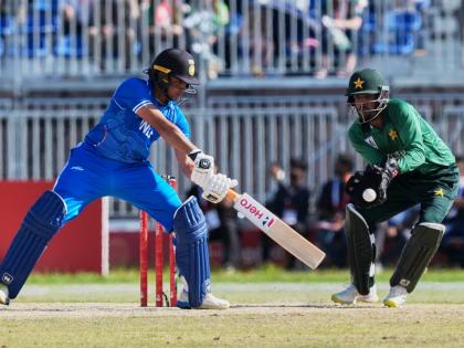 
India’s Abhishek Sharma (left) hits a shot during the gold medal cricket match against Pakistan at the Asian Games in Nagoya, Japan, yesterday.