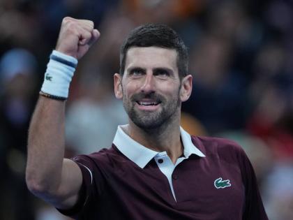 Novak Djokovic, of Serbia, celebrates after defeating Alexander Zverev of Germany in the men’s singles quarterfinals match at the China Open tennis tournament in Beijing, on Sunday, October 4. 