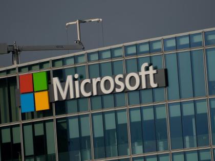 FILE - The logo of Microsoft is seen outside its French headquarters in Issy-les-Moulineaux, outside Paris, on May 13, 2024. (AP Photo/Thibault Camus, File)