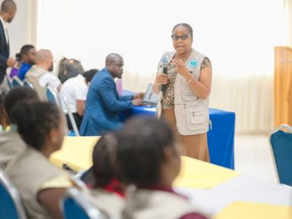 Deputy Managing Director, National Training and Programmes Division at the HEART/NSTA Trust, Dr Cheryl McLaughlin, addresses apprentices during the launch of the Apprenticeship for Creative Expressions (ACE) programme, held at the Tropics View Hotel in Man