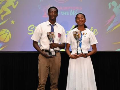 Jabari Matheson (left) of William Knibb Memorial High with the  Montego Bay Convention Centre Sports Boy of the Year Award in Track and Field and Shreya Guwalani of Mount Alvernia High with the St James Municipal Corporation Top Sports Girl of the Year Awa