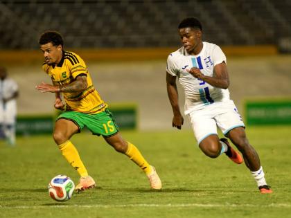Jamaica’s  Joel Latibeaudiere (left) and  Keyrol Figueroa of Honduras go in chase of the ball during the Concacaf Nations League fixture between Jamaica and Honduras held on September 28, 2026 at the National Stadium.