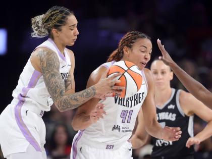 Golden State Valkyries forward Gabby Williams (left) and centre Kiah Stokes (41) collide while going for the ball against the Las Vegas Aces during the first half of Game 3 of the WNBA basketball semi-finals Friday, October 9, 2026, in Las Vegas.  