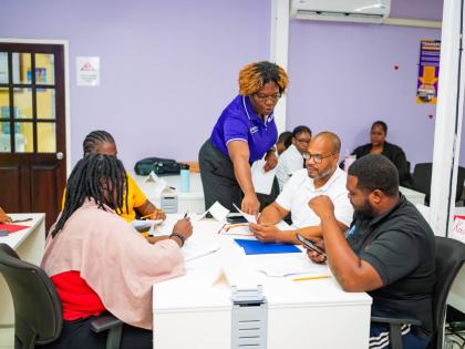 Allison Richards, business development officer and trainer at the Bureau of Standards Jamaica, guides participants through an interactive exercise during the inaugural Restaurant Food Safety Excellence programme, delivered through the Quality Institute in 