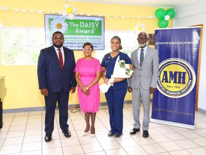 Lady Allen (centre), wife of Jamaica’s Governor-General and a former registered nurse, is flanked by Donmayne Gyles (left), president and chief executive officer of Andrews Memorial Hospital, and Merissa Geoghagen (right), the hospital’s inaugural DAIS