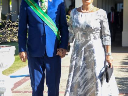 President of the Senate of Jamaica Tom Tavares-Finson and his wife, Rose, walk hand in hand as they pose for the lens.