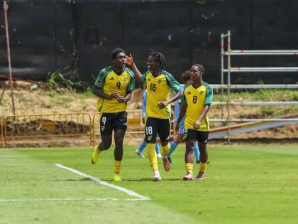 Jamaica’s Under-17 players celebrate during a World Cup Qualifier against Aruba.