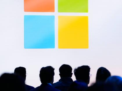 FILE - People attend a showcase event of the company’s AI assistant, Copilot, ahead of the annual Build developer conference at Microsoft headquarters, Monday, May 20, 2024, in Redmond, Wash. (AP Photo/Lindsey Wasson, File)