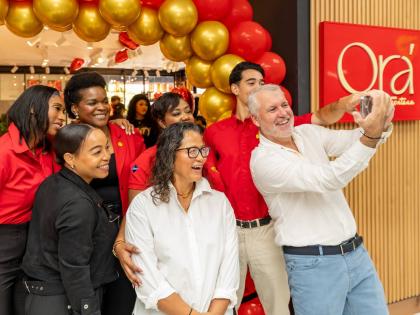 
Fontana CEO Anne Chang, in white, with stakeholders at the opening of Ora by Fontana at Sovereign Centre in St Andrew in 2025.