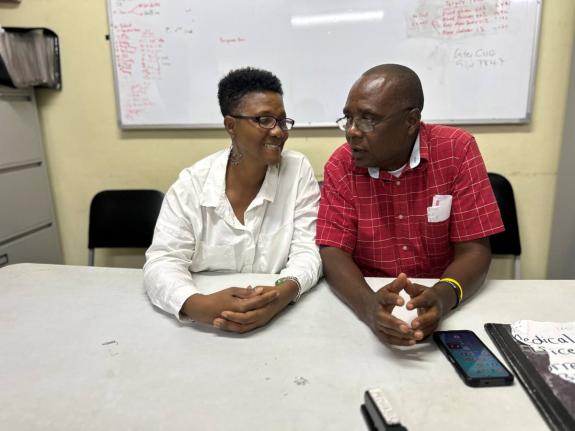 Founder of the MistyBlue Cancer Care Foundation, Dorothy Satchwell, is accompanied by Gerald Miller, Westmoreland health promotion and education officer, as she engages in a lively discussion on cancer treatment.