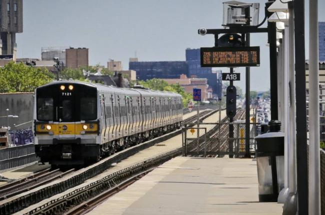 An Atlantic Terminal bound LIRR train arrives at the Nostrand Avenue station, July 9, 2017, in New York. 

