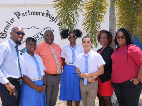 Principal of the St Catherine-based Greater Portmore High School, Ricardo Ross (third left), with (from left) Vice Principal, Kevin Wright; Vice President of the Student Council, Mauricih McIntosh; Head Girl at the school, Sashneik Nicholson; Prefect, Seth