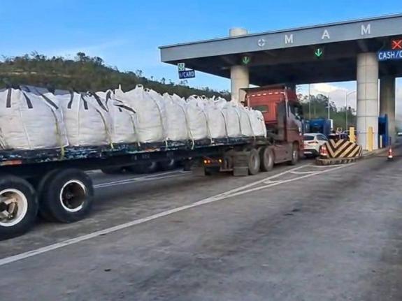 An ODPEM convoy at toll booth at Mammee Bay, St Ann, delivering relief supplies to storm‑hit parishes.