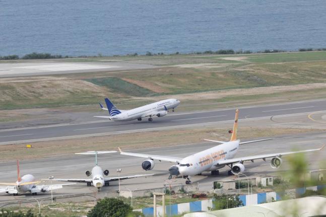 AP 
A COPA Airlines plane takes off at Simon Bolivar International Airport in Maiquetia, Venezuela, days after the government revoked operating rights for international airlines that suspended flights following a warning from the US Federal Aviation Admini