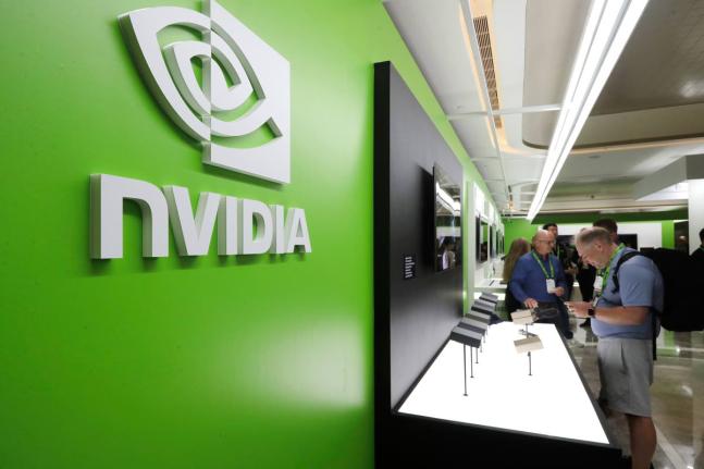 
People take a look to Nvidia’’s new products during the Computex 2025 exhibition in Taipei, Taiwan, on Wednesday, May 21, 2025.