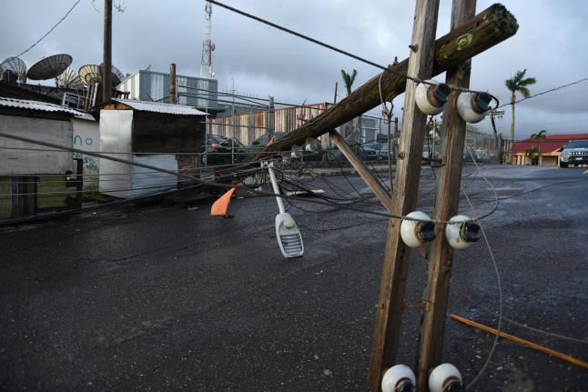 A JPS electricity pole broken by the passage of Hurricane Melissa is seen in Mandeville, Manchester.
