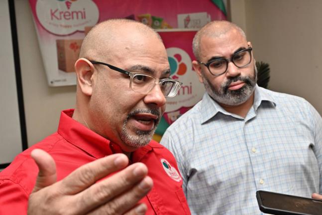 
Christopher Clarke,(left) Executive Director and CEO of Caribbean Cream Ltd (Kremi); and Dr. Matthew Clarke, Non-Executive Director and Chairman of Caribbean Cream Ltd (Kremi) speaks at the Caribbean Cream Ltd (Kremi) ‘Building on a Solid Foundation’ 
