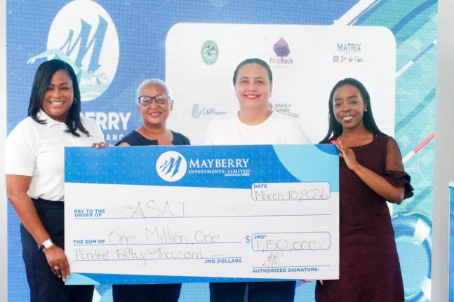  Solidifying their financial commitment to aquatic sports, Mayberry Investments Limited executives present a sponsorship cheque of  $1,150,000 to the Aquatic Sports Association of Jamaica on Tuesday, March 10.  From left:  Karen Hall, Assistant Vice Presid