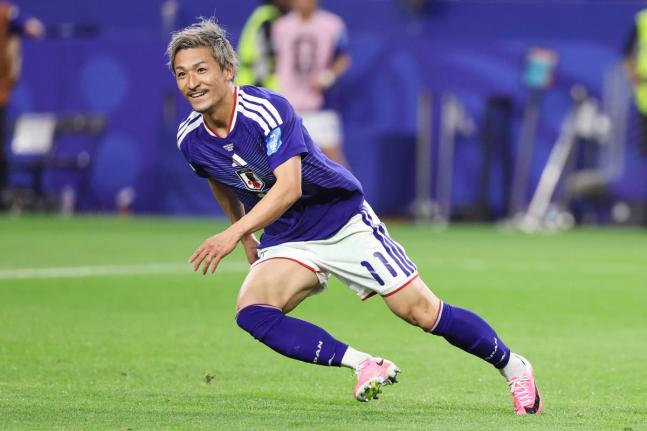 AP 
Japan’s Daizen Maeda (11) reacts after scoring his team’s first goal during the World Cup Group F football match against Sweden in Arlington, Texas, near Dallas, Thursday, June 25.