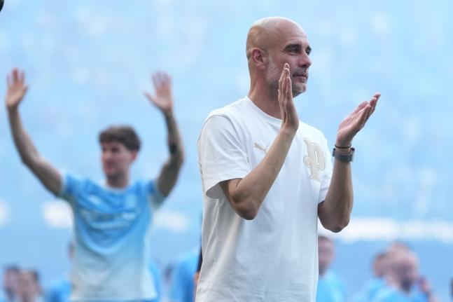 AP 
Manchester City’s head coach Pep Guardiola applauds the fans after his last game with the club after a Premier League football match against Aston Villa in Manchester, England, May 24.