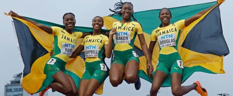 Jamaica’s 4x100-metre relay team celebrate winning the World U20 Championships title in Lima, Peru in 2022.