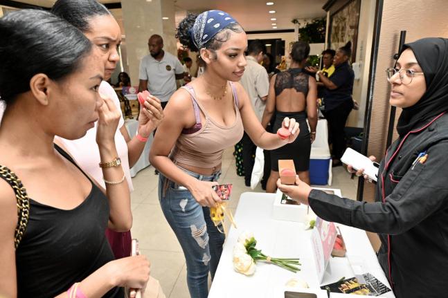 These ladies partake of an offering at the 11th staging of the Ministry of Tourism/Tourism Enhancement Fund’s Christmas in July trade show at The Jamaica Pegasus hotel in New Kingston on Friday, July 10, 2026. 
