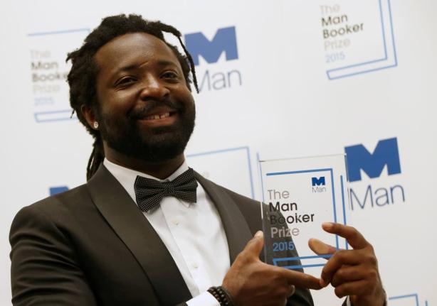 Marlon James poses with the Man Booker Prize after his book ‘A Brief History of Seven Killings’ was named as winner of the 2015 Booker Prize 2015 for Fiction, following the award ceremony at the Guildhall in London on October 13, 2015.