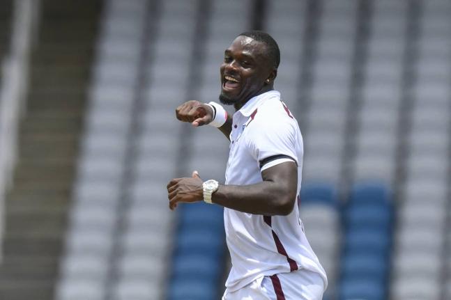 West Indies paceman Jayden Seales celebrates one of his five wickets during yesterday’s Test match against Pakistan at the Brian Lara Cricket Academy in Tarouba, Trinidad.