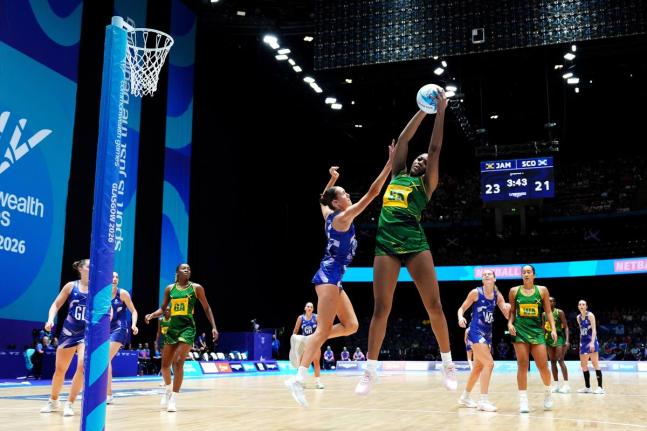 Azara Wilmot of Jamaica (centre right) and Cerys Finn of Scotland in action during the Netball preliminary round Pool B match at the Commonwealth Games in Glasgow, Scotland, yesterday.