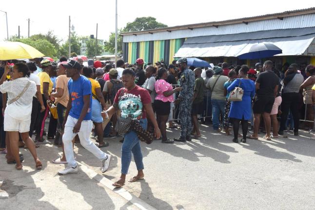 Hundreds of Jamaicans brave the sweltering heat to try secure tickets for the Grand Gala on August 6, 2026 at the National Stadium.