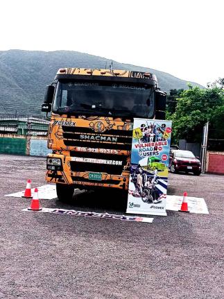 Caribbean Cement Company Limited hosts its Vulnerable Road User Initiative at Rollington Town Primary School in Kingston on June 17, promoting road-safety awareness among students.