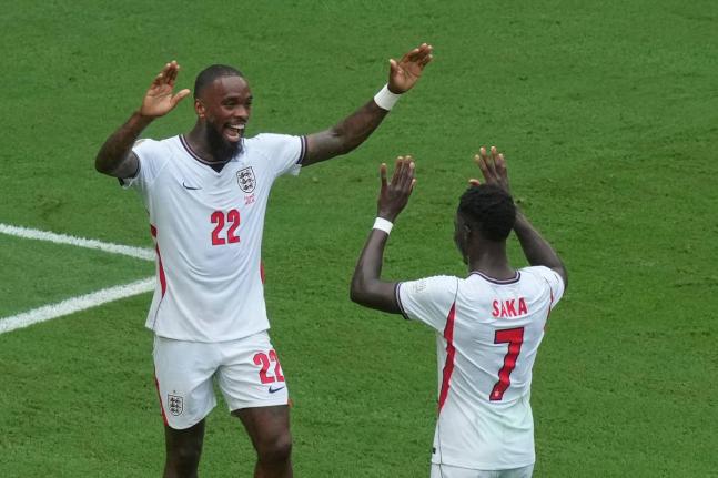 England’s Bukayo Saka (left) celebrates scoring their third goal with Ivan Toney during the World Cup third-place playoff match between France and England in Miami Gardens, Florida., Saturday, July 18, 2026.