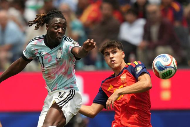 Belgium’s Jeremy Doku (left) and Spain’s Pau Cubarsi vie for the ball during the World Cup quarterfinal match between Spain and Belgium in Inglewood, California, Friday, July 10, 2026. 