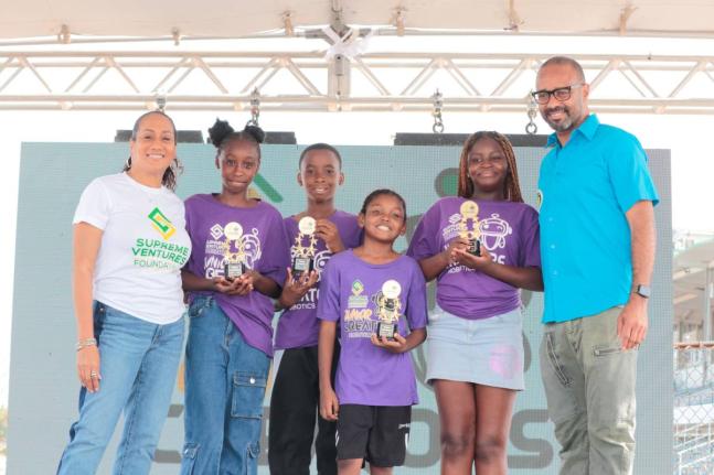 The top four campers at the Supreme Ventures Foundation (SVF) Junior Creators Robotics Camp celebrate their SVF Robotics Scholarship wins. Pictured with Heather Goldson (left), executive director of the Supreme Ventures Foundation, are (from second left) K