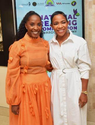 Chair of the Jamaica Library Board, Nicole McLaren Campbell (right), shares a photo opportunity with the Jamaica Library Service’s (JLS’s) new Reading Ambassador, Renee Wallace, during the JLS 2026 National Reading Competition Awards Ceremony, held at 