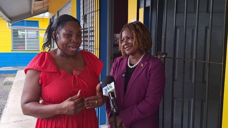 Senator Dr Dana Morris Dixon (right), minister of education, skills, youth and information, listens keenly to Tracie Campbell, principal of Ferris Primary School, in Westmoreland, as she expresses gratitude over the readiness of the institution ahead of ne