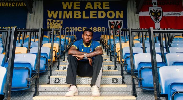 Dujuan Richards in thee stands a Wimbledon.