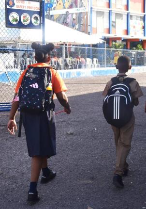Students of Edward Seaga Primary School in Kingston arrive for classes on the first day of the 2026/27 academic year on Monday.