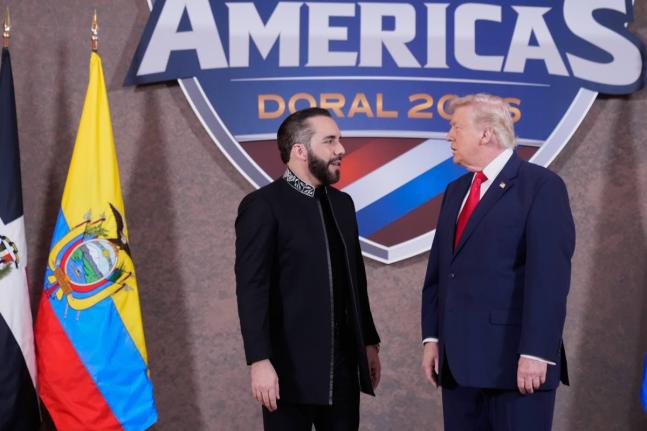 President Donald Trump greets El Salvador’s President Nayib Bukele (left) at the Shield of the Americas Summit, March 7, at Trump National Doral Miami in Doral, Florida.