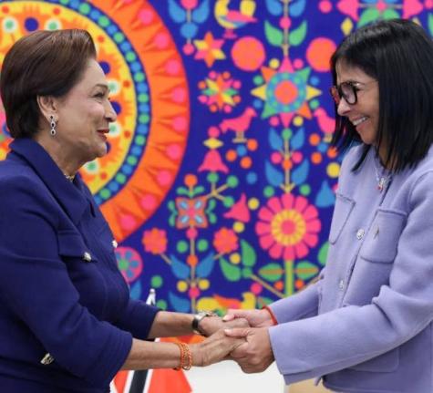 In this photo Prime Minister of Trinidad and Tobago Kamla Persad- Bissessar and acting Venezuelan President Delcy Rodríguez are seen greeting each other in New York on the sidelines of the UNGA.