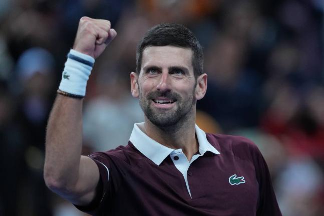 Novak Djokovic, of Serbia, celebrates after defeating Alexander Zverev of Germany in the men’s singles quarterfinals match at the China Open tennis tournament in Beijing, on Sunday, October 4. 