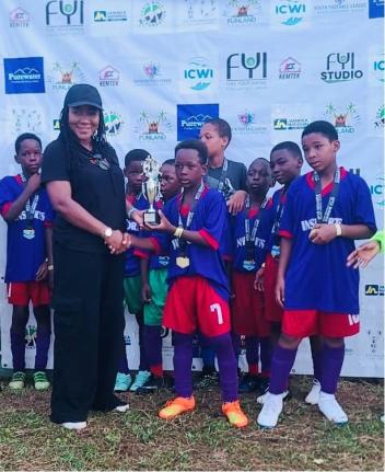 Duanvale players celebratee winning the  Trelawny leg of the Junior Cup U11 Youth League football competition on Saturday..