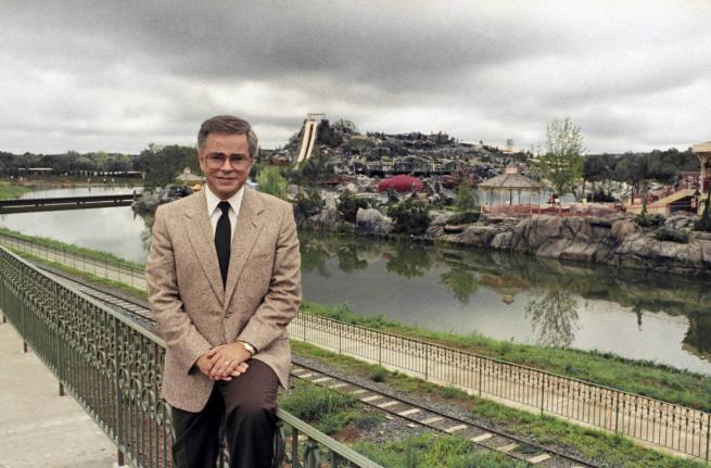 FILE - Television evangelist Jim Bakker poses in front of the Water Park in Columbia, SC, one of the attractions at his Heritage USA, March 19, 1987. (AP Photo/Lou Krasky, File)