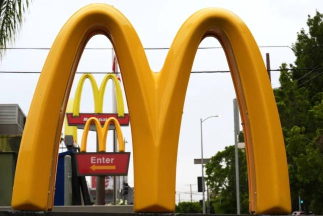 AP
McDonald’s Golden Arches signs are seen on March 31 in Los Angeles. 