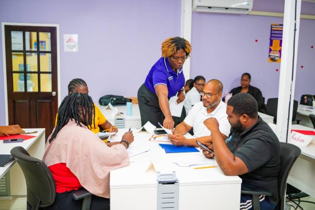 Allison Richards, business development officer and trainer at the Bureau of Standards Jamaica, guides participants through an interactive exercise during the inaugural Restaurant Food Safety Excellence programme, delivered through the Quality Institute in 