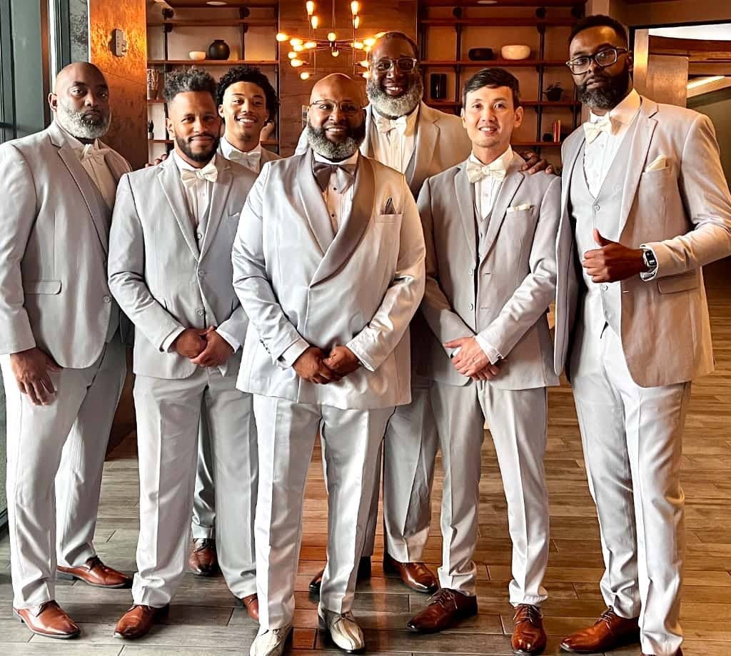 The groom, Michael Grant (centre), flanked by his groomsmen in the back row (from left), son Nehemiah Waller, and Akil Waite, and in the front row (from left) DeWayne Little, Steven Swann, Milton Hung and best man, uncle Dwayne Grey.