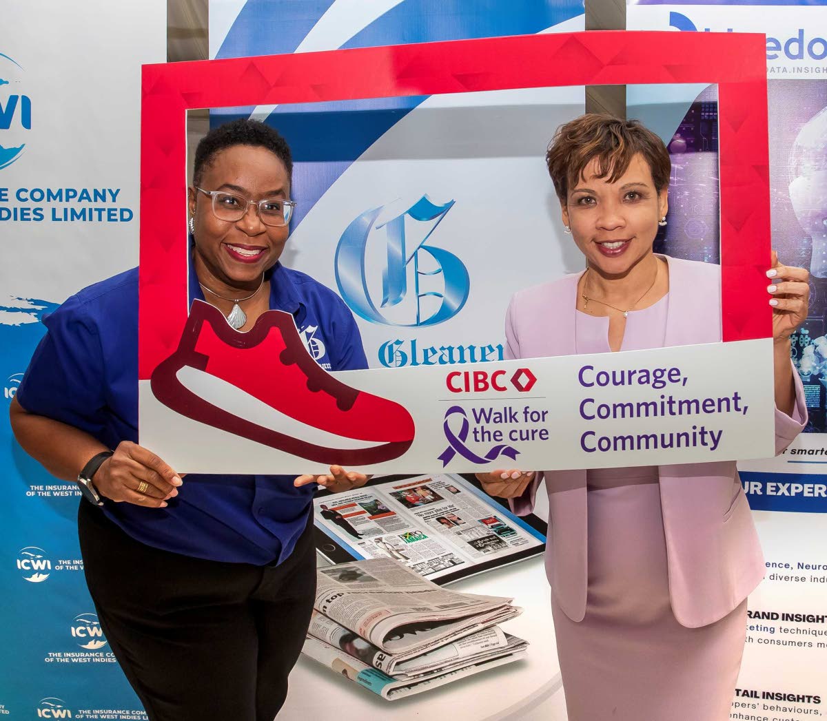  Annique Dawkins (right), head of country, CIBC Caribbean, with sponsor representative Racquel McLean of the RJRGLEANER Communications Group at the launch of the 14th annual CIBC Caribbean Walk for the Cure.