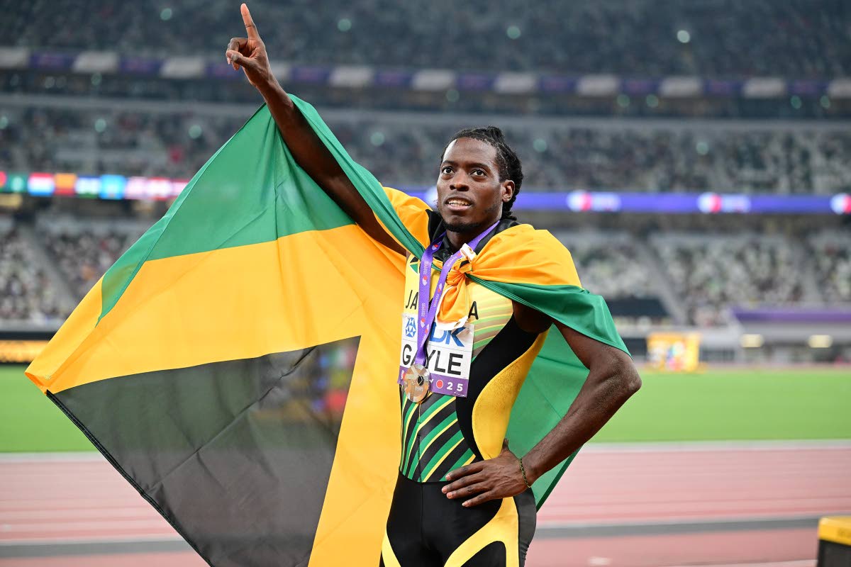 Tajay Gayle mined silver in the long jump.Tajay Gayle mined silver in the long jump.Tajay Gayle mined silver in the long jump.Tajay Gayle mined silver in the long jump.