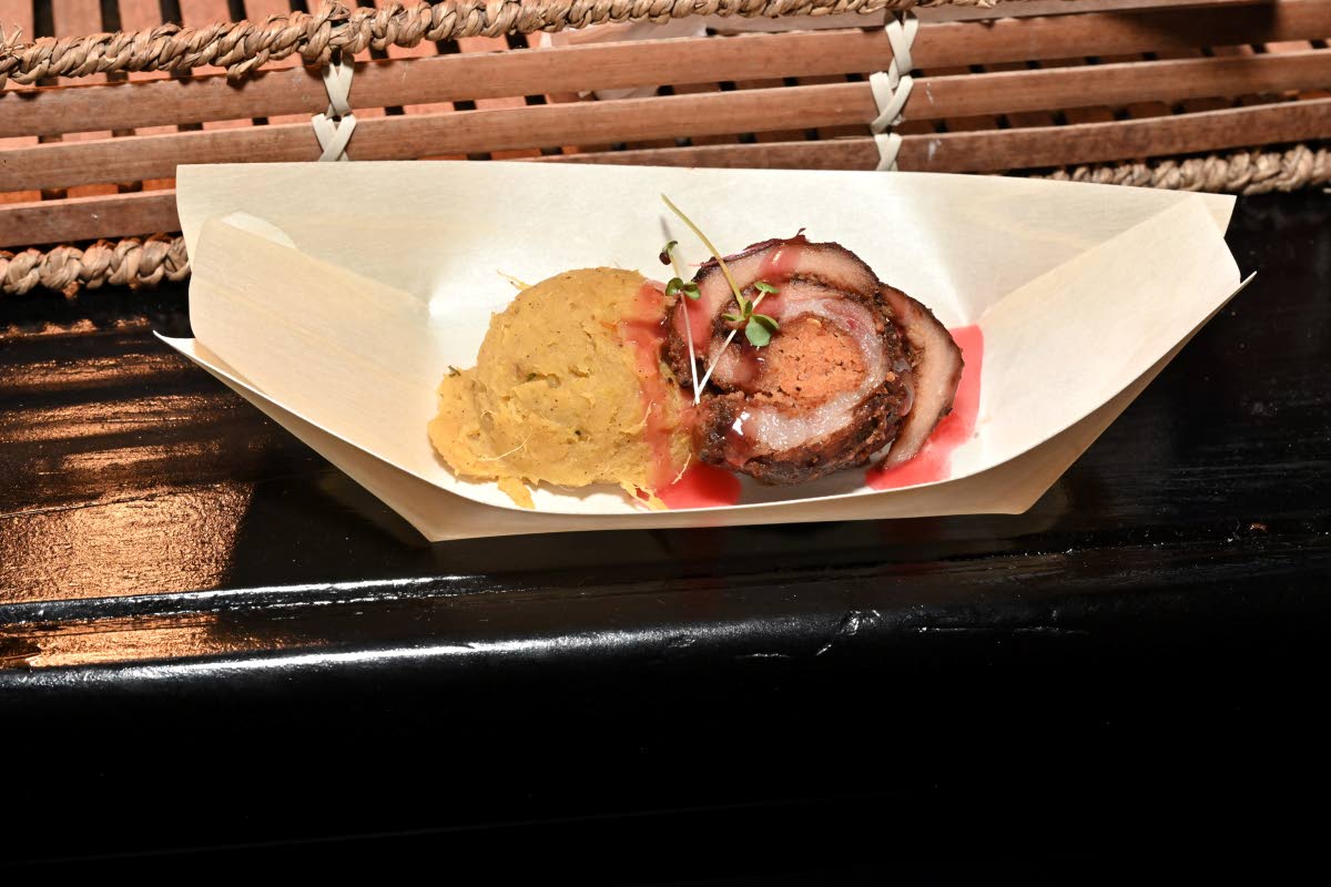 Chef Theo Smith pairs the jerked sausage-stuffed pork loin bites with sweet potato mash.
