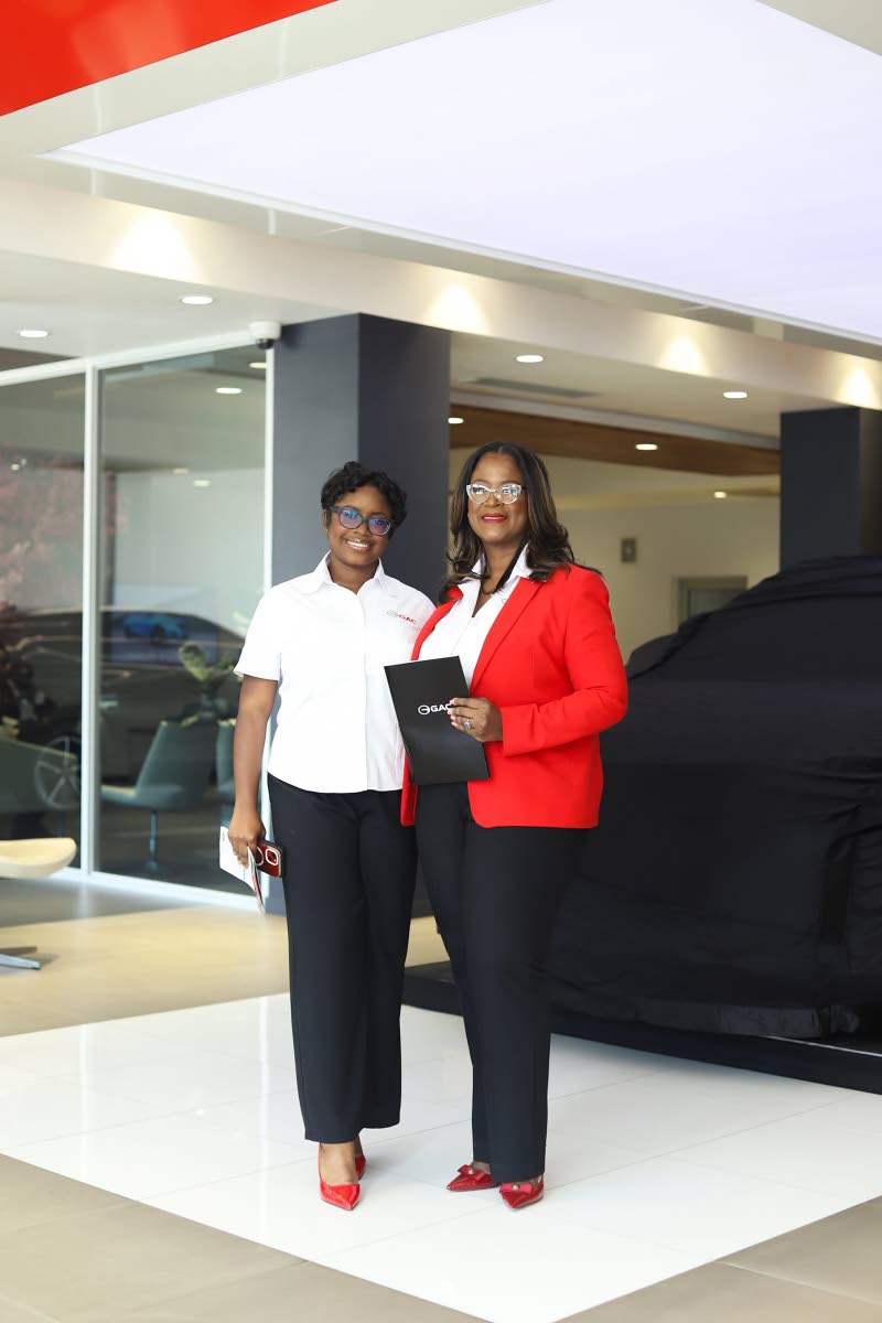 Ms Anna-Kaye Wright, Marketing Officer (left) and Mrs. Deborah Stewart, General Manager (right) of Fidelity Motors Limited pose for a photograph at the recent GAC vehicle launch.